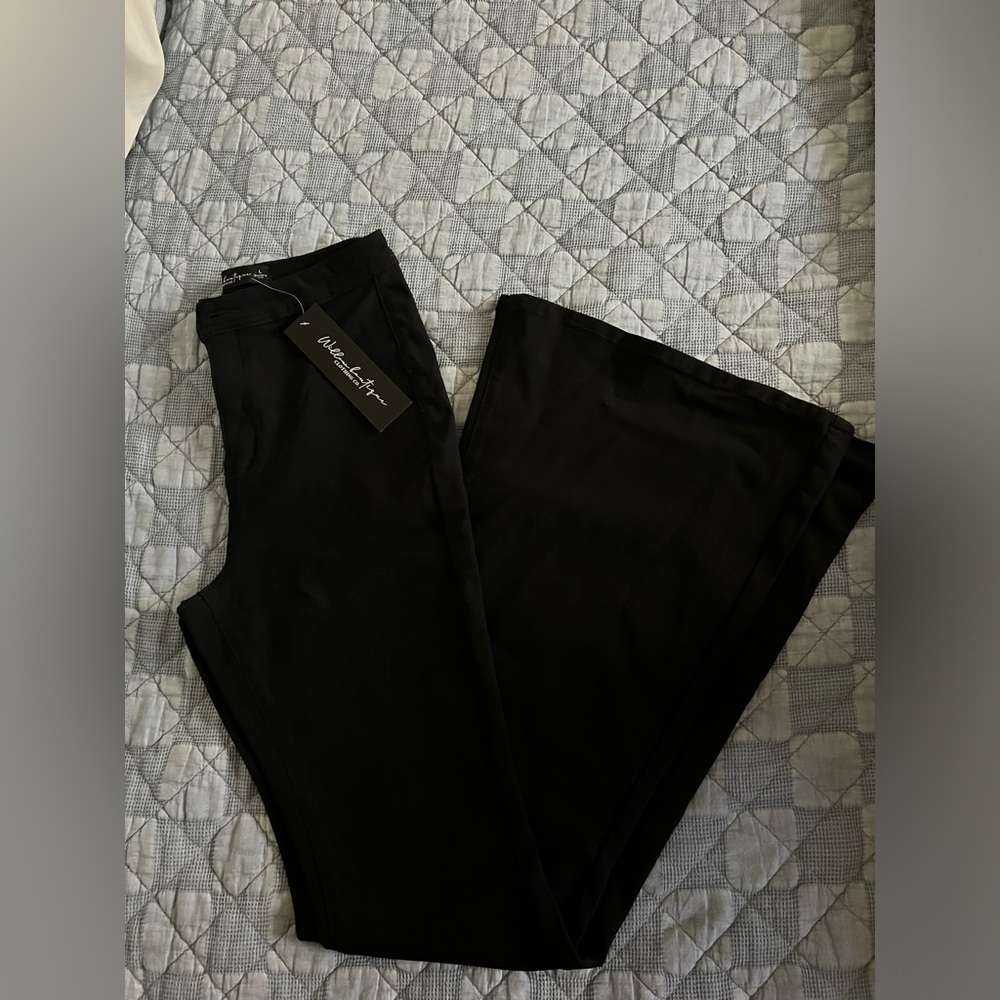 Bell bottom black pants. These are stretchy. 34 in inseam